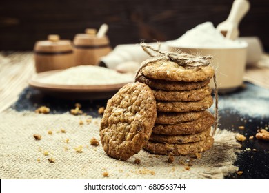 Domestic Stacked Biscuit Sweet Cookie With The Sesame,peanuts,sunflower Background On Wooden Table Close Up 