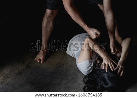 Domestic violence concept,Scared woman protecting from men aggression.  depressed woman, Stop violence against women,International women's day photos