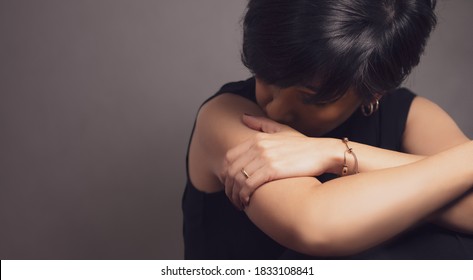 Domestic Violence During COVID-19 Concept. A Married Asian Woman Victim Crying, Feeling Unhappy, Sorrow And Frightened. The Shadow Pandemic Campaign, Marriage Problem, Physical Abuse, Woman Rights.