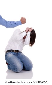 Domestic Violence: Hand Of A Man, Hitting A Woman Who Cringes, Isolated On White Background