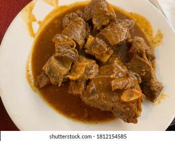 Dominican Cuisine: Plate Of Stewed Oxtail