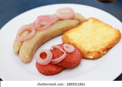 Dominican Food Brealkfast, Guineitos With Fries Cheese, Salami And Onions