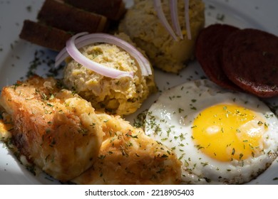 Dominican Mangu With The Three Punches, Egg, Cheese, Salami And Pork Rinds