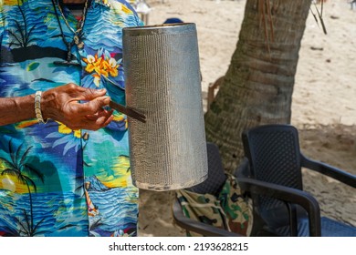 Dominican Republic. The Beach Musician Plays The Guiro. Merengue Music. Dominican People.