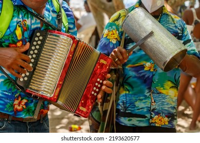 Dominican Republic. Beach Musicians. Merengue Music. Playing The Accordion And Guiro.