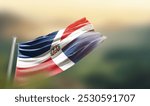 Dominican Republic flag waving with beautiful background. The flag blowing with green blur background. Dominican Republic national flag for independence day.