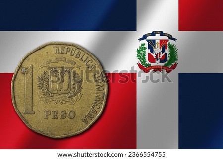 Dominican Republic peso coin on national flag