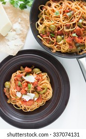 Dominican Style Spaghetti With Tomato Sauce, Salami And Green Olives