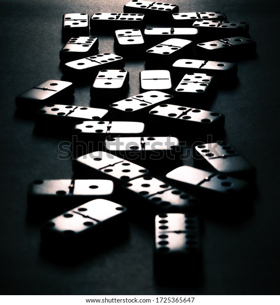 domino effect in\
business success concept, set of domino on dark background,\
businesses ideas,  domino effect, strategy and successful\
interventions for\
business