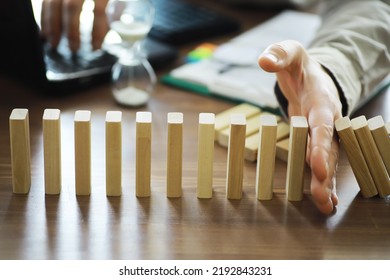 The Domino Effect Stopped By A Unique, One Strong Piece Stop The Falling, Be Stable In Crisis, Business Solution Concept