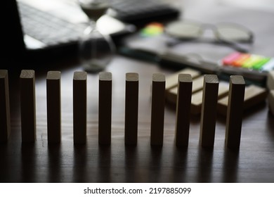 The Domino Effect Stopped By A Unique, One Strong Piece Stop The Falling, Be Stable In Crisis, Business Solution Concept