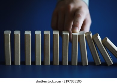 The Domino Effect Stopped By A Unique, One Strong Piece Stop The Falling, Be Stable In Crisis, Business Solution Concept