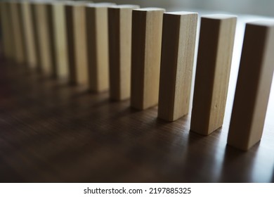 The Domino Effect Stopped By A Unique, One Strong Piece Stop The Falling, Be Stable In Crisis, Business Solution Concept