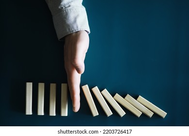 The Domino Effect Stopped By A Unique, One Strong Piece Stop The Falling, Be Stable In Crisis, Business Solution Concept