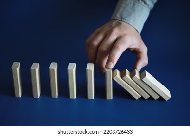 The Domino Effect Stopped By A Unique, One Strong Piece Stop The Falling, Be Stable In Crisis, Business Solution Concept