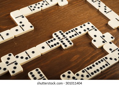 Domino Game Tiles On Wooden Table