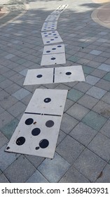 Dominoes On Ground On Calle Ocho, Miami