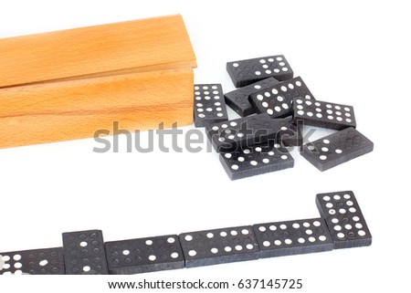 Dominoes on a white background. Close-up. Tree. A game.