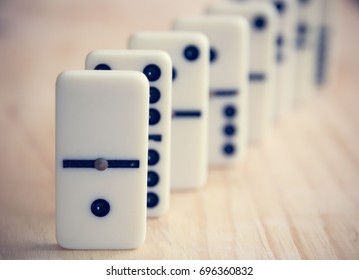 Dominoes on wooden table - Powered by Shutterstock