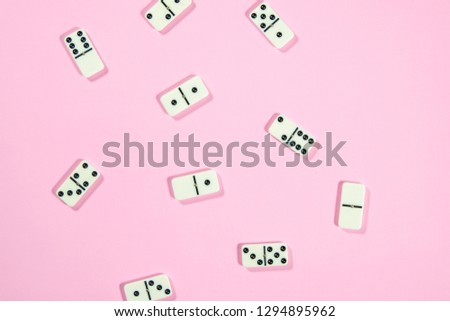 Dominoes with pink background, games of strategy 