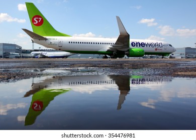 DOMODEDOVO, MOSCOW REGION, RUSSIA - AUGUST 2 2011: S7 Airlines Boeing 737-800 VQ-BKW In One World Alliance Livery Shown At Domodedovo International Airport.