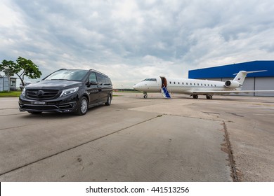 DOMODEDOVO, MOSCOW, RUSSIA - JUNE 03, 2016: Private busines Jet airplane with Mercedes Benz V-class luxury car with tuning kit of Larte Design Tuning Company shown together at international airport - Shutterstock ID 441513256