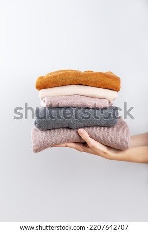 Donating old warm clothes, second hand, economic crisis, fighting the cold, warm clothes, saving money.