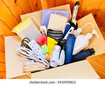donation box, unused items in the cardboard box. - Shutterstock ID 1919939813