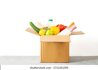 Donation Box With Various Smart Food On White Background With Copy Space. Mockup. Food Donations Or Food Delivery Service Concept. Online Shopping During Coronavirus Covid-19 Lockdown