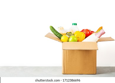 Donation Box With Various Smart Food On White Background With Copy Space. Mockup. Food Donations Or Food Delivery Service Concept. Online Shopping During Coronavirus Covid-19 Lockdown