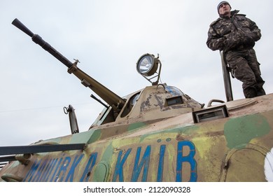 DONBASS, UKRAINE - NOVEMBER 25, 2014: Ukrainian soldiers on Ukraine's eastern front lines. The Donbas war has raged on since 2014, opposing Ukrainian forces to pro-Russia armed groups.