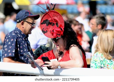 DONCASTER RACECOURSE, SOUTH YORKSHIRE, UK : 13 August 2022 : Racegoers At Doncaster Races Enjoying The Social Occasion