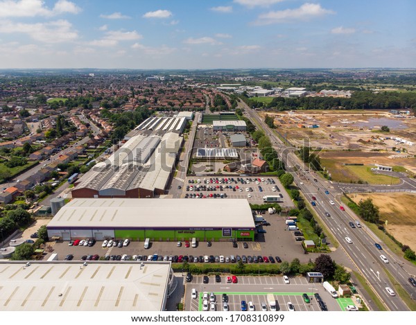 Doncaster UK, 28th June 2018: Aerial\
photo of the Doncaster Ready Steady Store storage premises showing\
the outside of the main building on a sunny summers\
day.