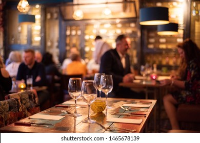 Doncaster, UK - May 11 2019: Diners Enjoy An Argentine Steak And The Stylish Interior Of La Boca Restaurant & Steakhouse On Saturday 11 May At 1 Netherhall Road