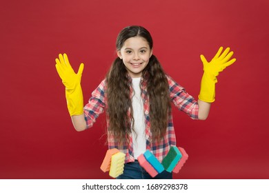 I am done. Housekeeping duties. Turn cleaning into game. Inculcate cleanliness. with sponge. Cleaning could be fun. Cleaning supplies. Girl rubber gloves for cleaning hold colorful sponges. - Shutterstock ID 1689298378