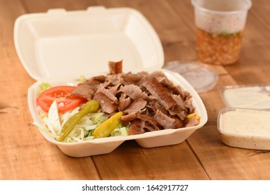 Doner plate to take away in Germany, Turkish fast food in a plastic box

