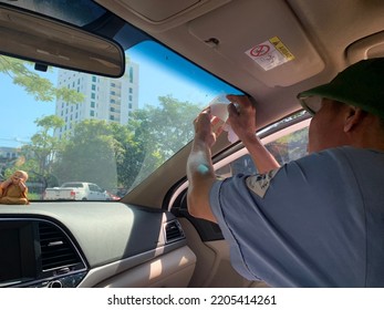 In Dong Hoi City, Quang Binh, Vietnam - September 20, 2022: Photo Of Motor Vehicle Registration Station Staff Affixing Stamps Certifying Automobile Quality Inspection