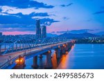 Dongjak Bridge and Han River Can see beautiful night time views of landscape Seoul city and Namsan Tower. At Dongjak Bridge, Seoul, South Korea.