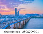 Dongjak Bridge and Han River Can see beautiful night time views of landscape Seoul city and Namsan Tower. At Dongjak Bridge, Seoul, South Korea.