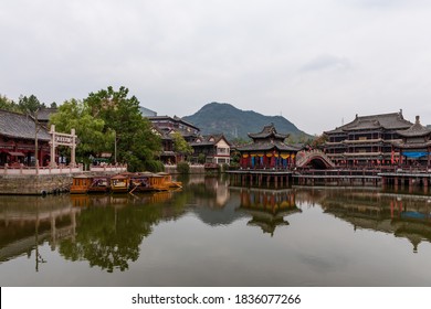 Dongyang, China - October 17, 2020: Architecture At Riverside Scene At The Pure Moon Festival, One Of Hengdian World Studios In Dongyang, Jinhua, Zhejiang. Recreation Of Famous Song Dynasty Painting.