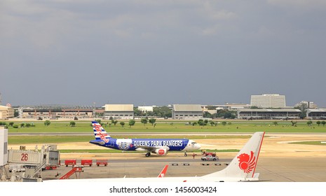 DON-MUEANG, BANGKOK - JUL, 2019 : Don-mueang International Airport View,  Airplane Tugs, And Baggage Tug Operate In Ground Handling Services At Don-mueang International Airport.