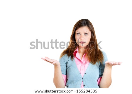 Don't ask me! A closeup portrait of a clueless attractive female gesturing with hands out isolated on a white background with copy space