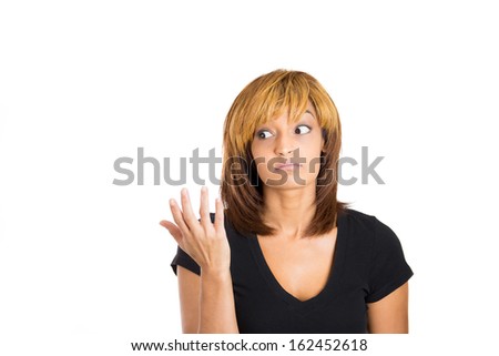 Don't ask me! Closeup portrait of a clueless attractive young woman putting hands up as to say I don't know, isolated on white background with copy space. Negative human emotions facial expressions 