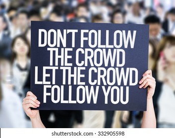 Don't Follow The Crowd Let The Crowd Follow You Placard With Crowd Background