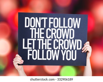 Don't Follow The Crowd Let The Crowd Follow You Placard With Bokeh Background