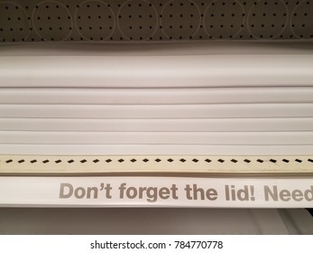 don't forget the lid sign with a stack of lids