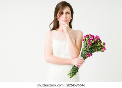 I Don't Know If I Want To Marry. Upset Young Bride Thinking And Doubting About Getting Married On Her Wedding Day 