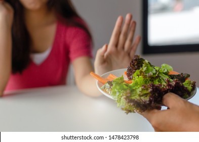 I Don't Like Eating Vegetables. Unhappy Young Pretty Woman Slim Body Refuse To Eat Fresh Vegetables Salad At Home, Weight Loss, Healthy Lifestyle, Dieting, Loss Of Appetite And Healthy Food Concept
