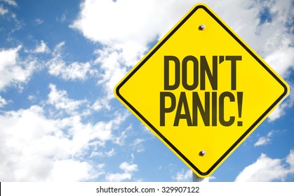 Dont Panic! sign with sky background