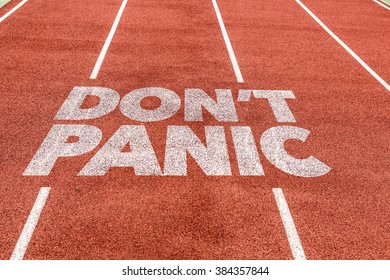 Don't Panic written on running track